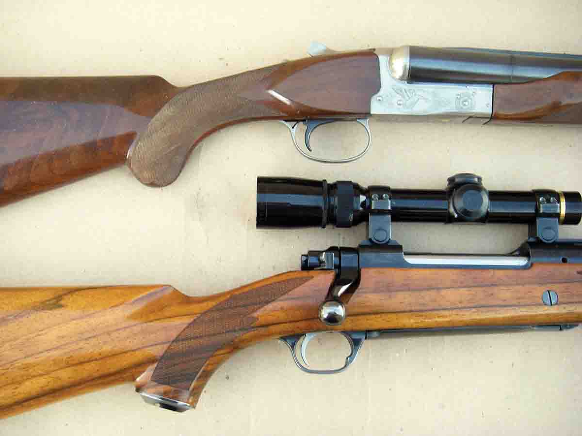 Many bolt-action sporting rifles feature a pistol-grip stock patterned after shotguns. At top is a Winchester Model 23 12-gauge shotgun while the rifle on bottom is a Ruger Express Magnum .375 H&H Magnum.